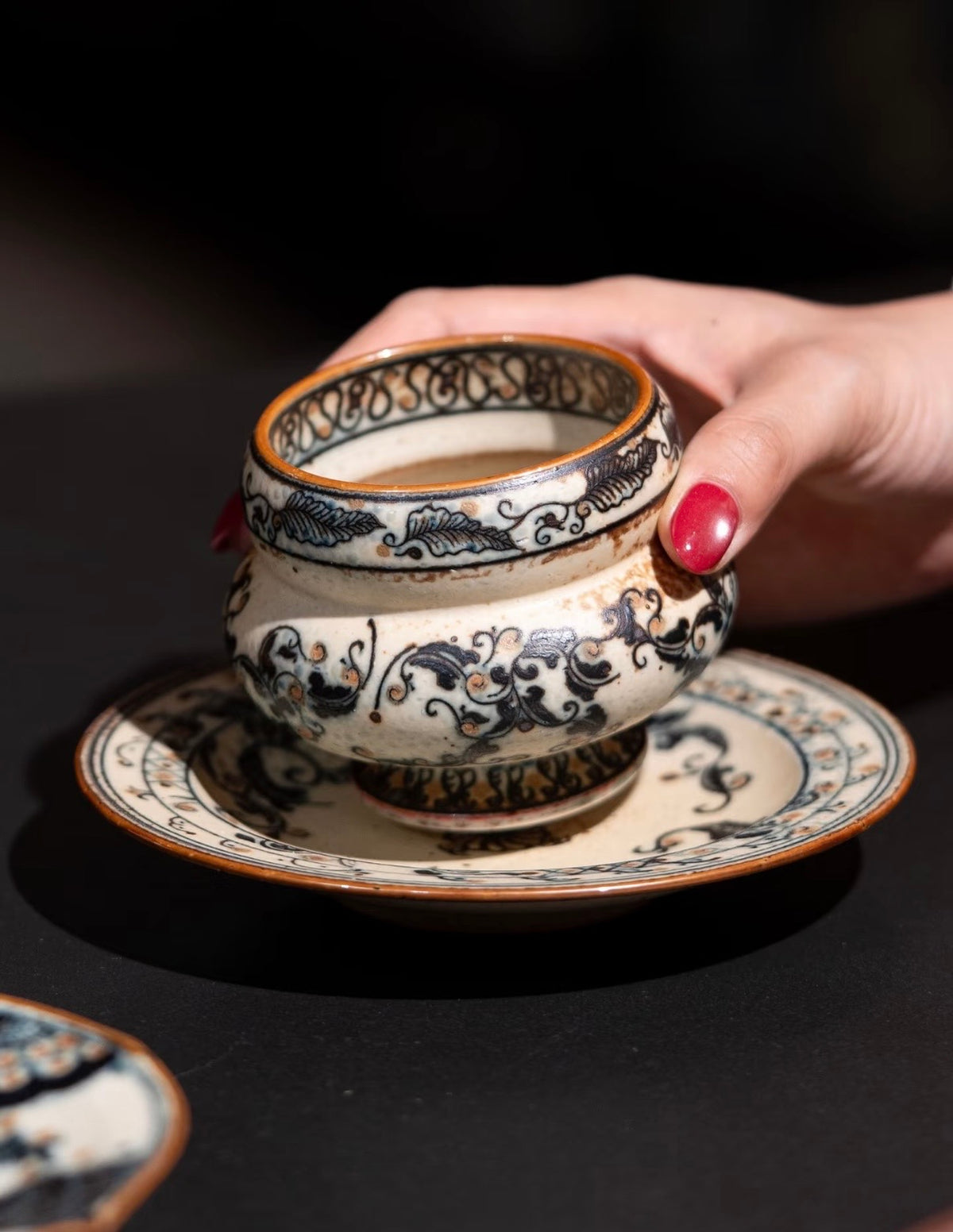 The Gilded Scroll Ring Cup