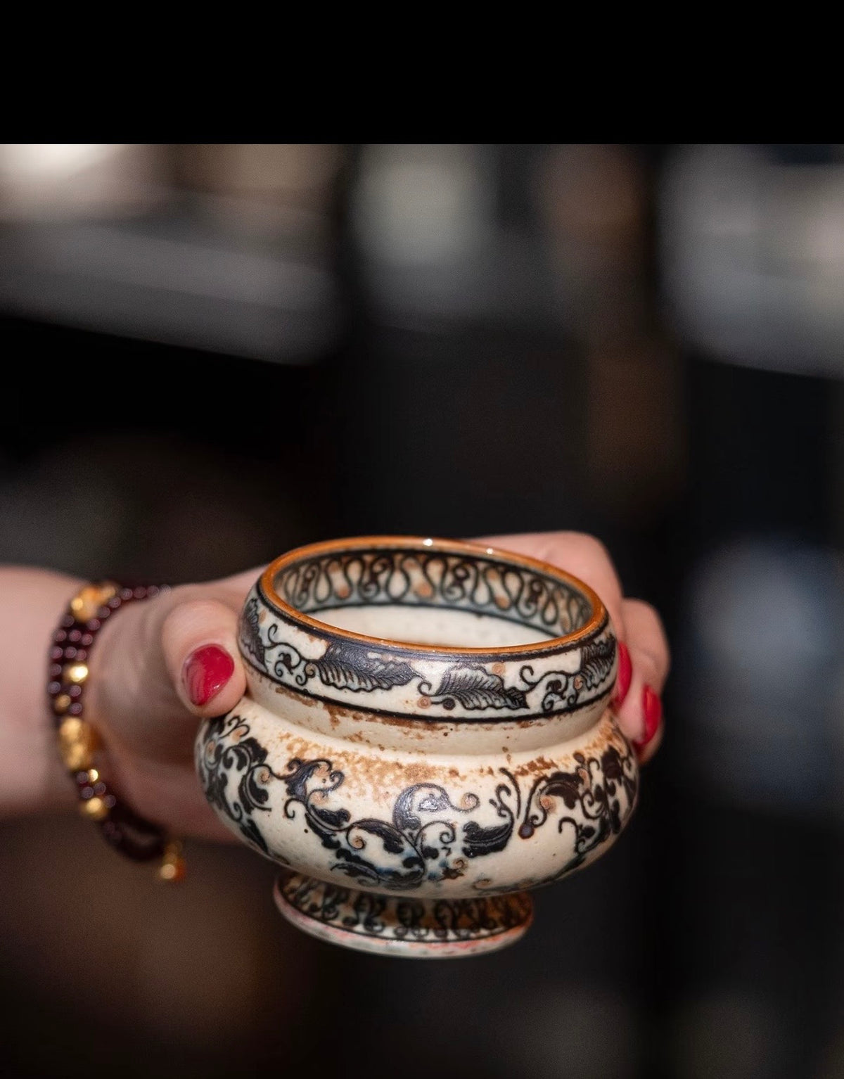 The Gilded Scroll Ring Cup