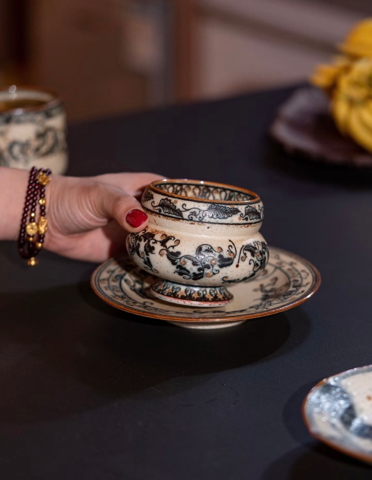 The Gilded Scroll Ring Cup