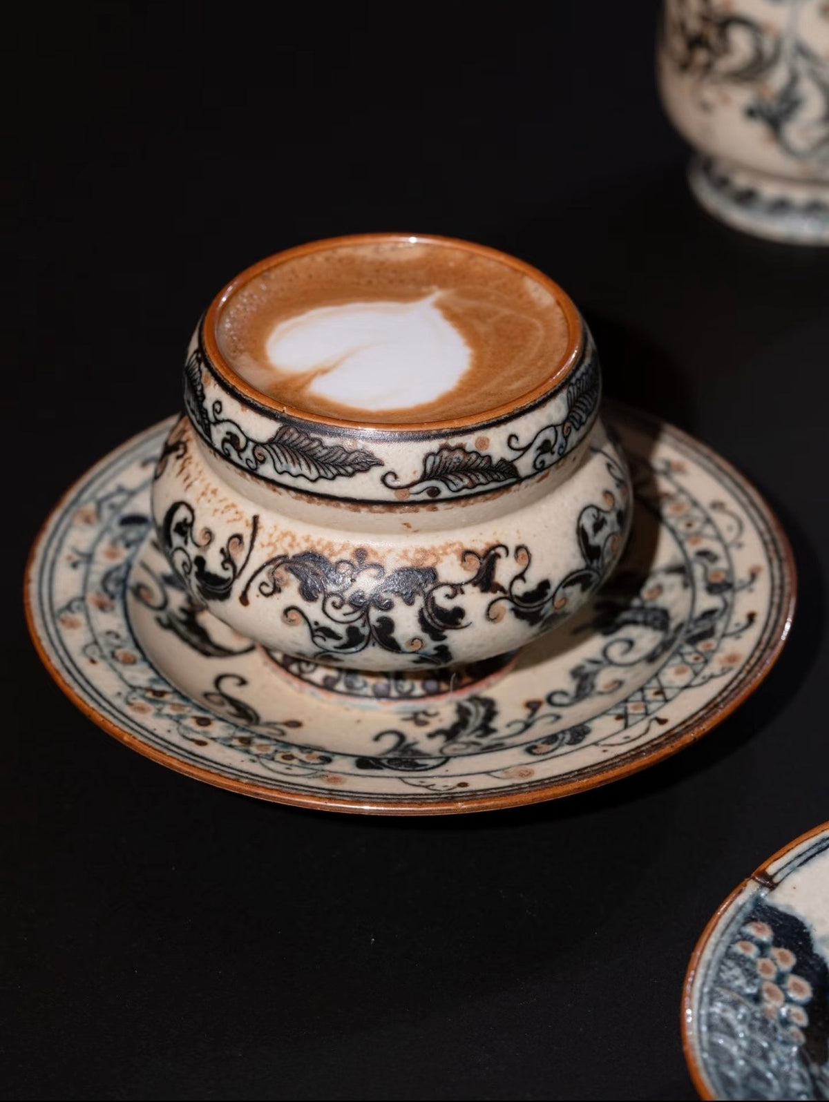 The Gilded Scroll Ring Cup
