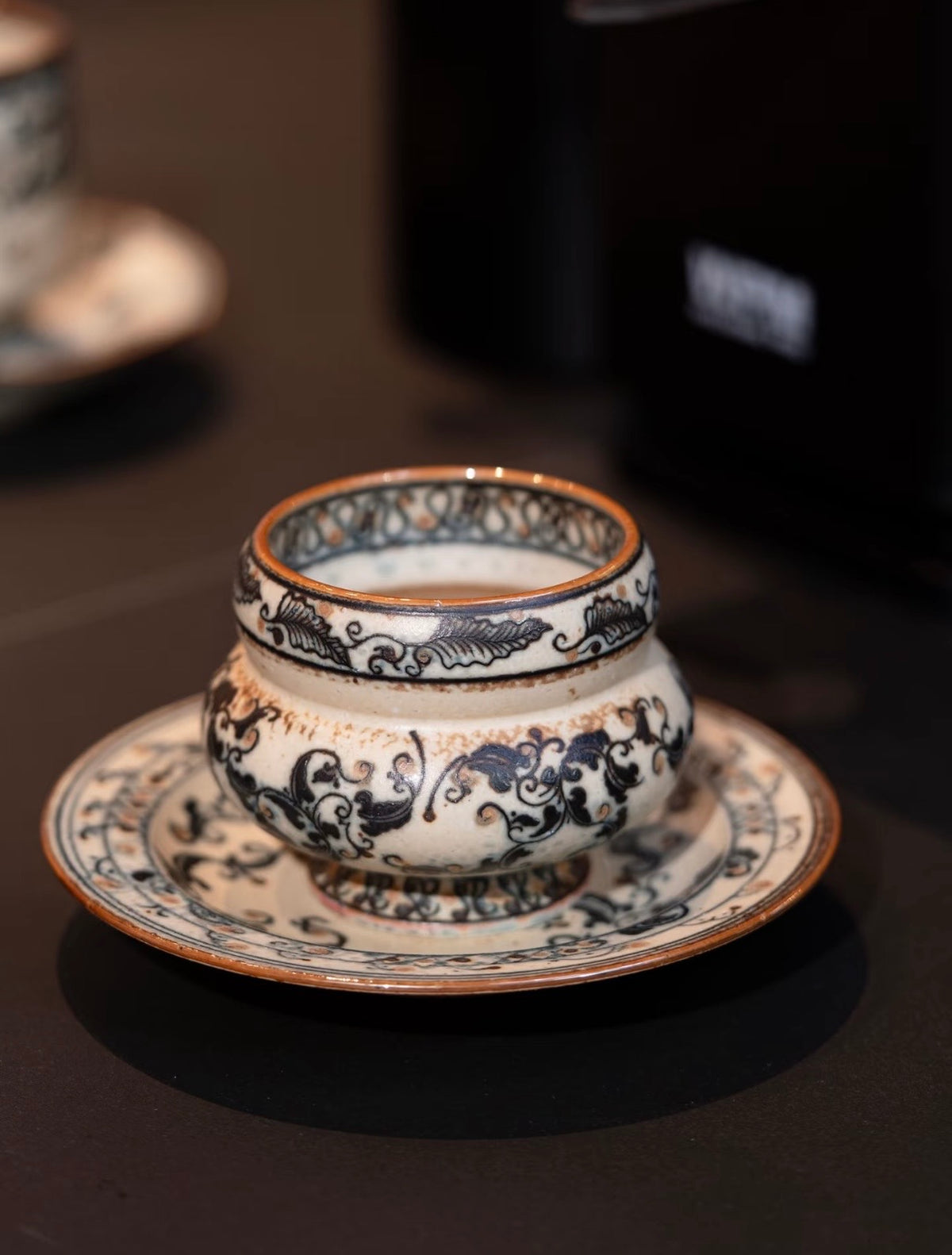 The Gilded Scroll Ring Cup
