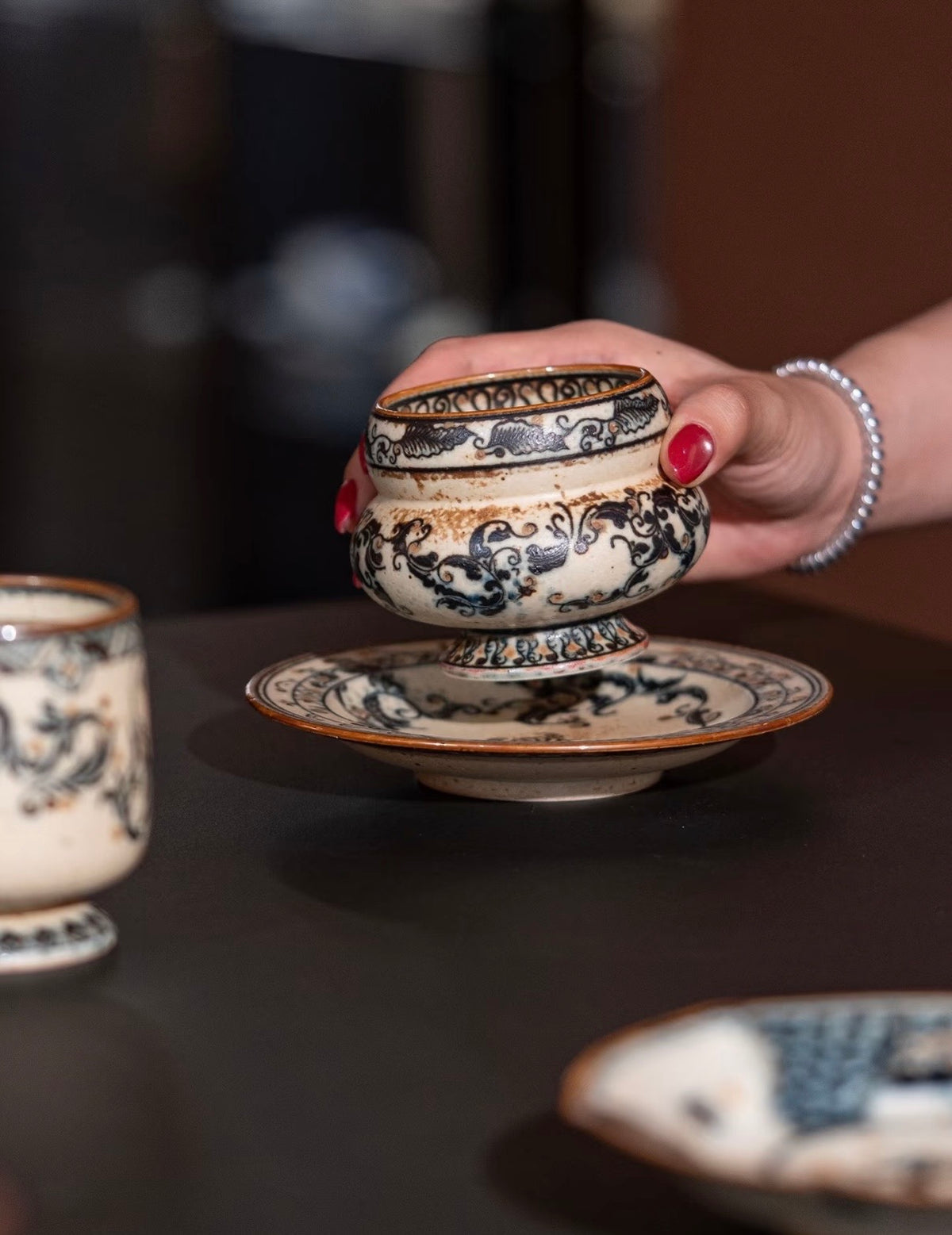 The Gilded Scroll Ring Cup