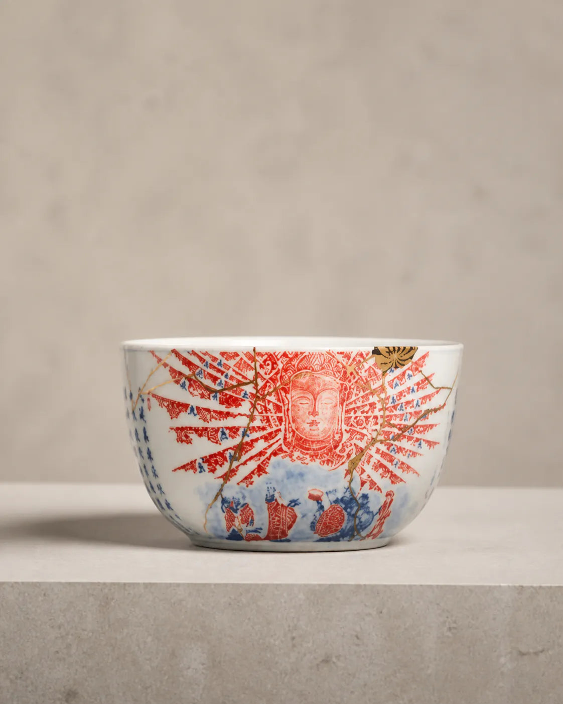 Porcelain bowl with iron-red Guanyin motif and gold kintsugi repair